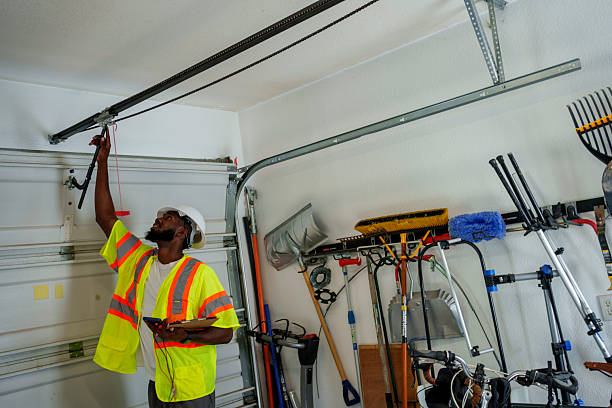 Professional Garage Door technician working in Wells, MN